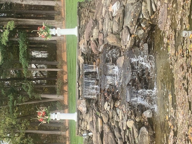 Ceremony arrangements displayed on pillars