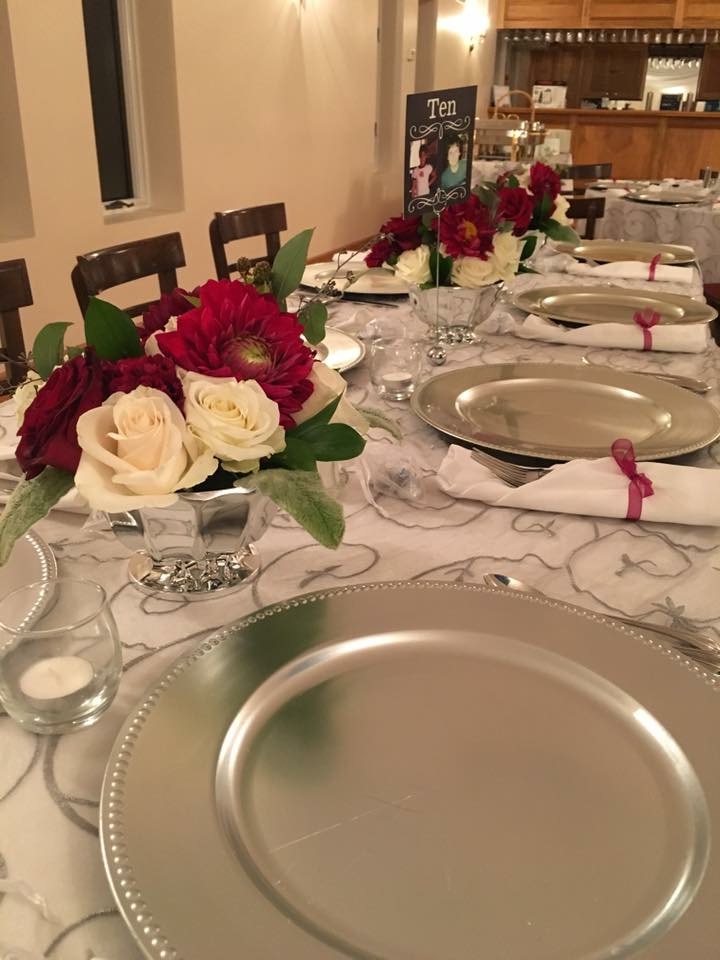 Fuchsia gerbera daisy and white rose centerpiece