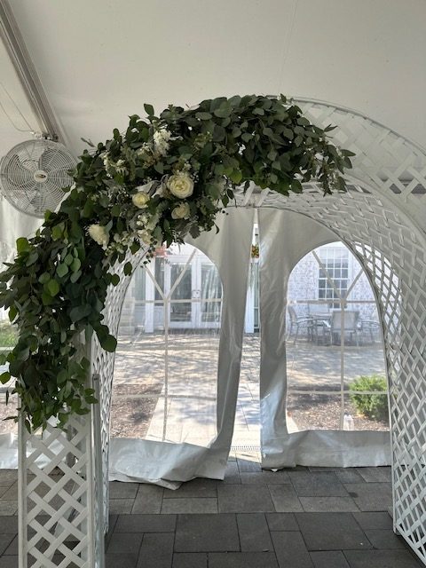 Greenery and white rose arbor swag