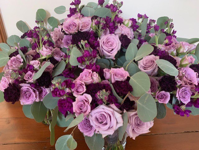 Lavender rose and purple stock arrangement
