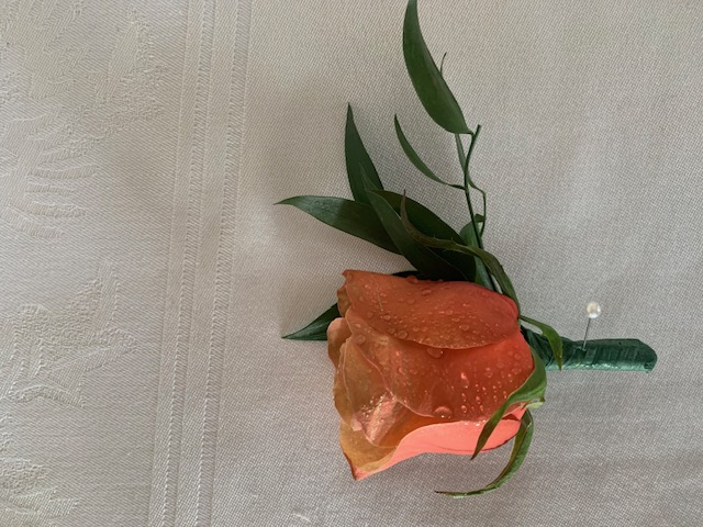 Orange rose boutonniere
