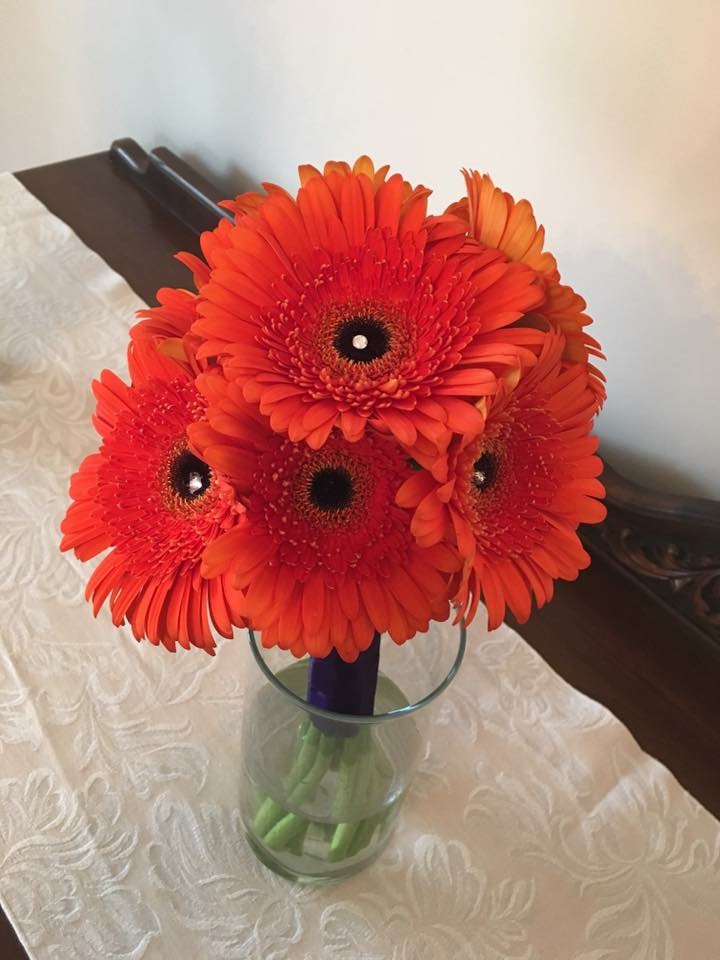 Orange gerbera daisy bouquet with sequin accents
