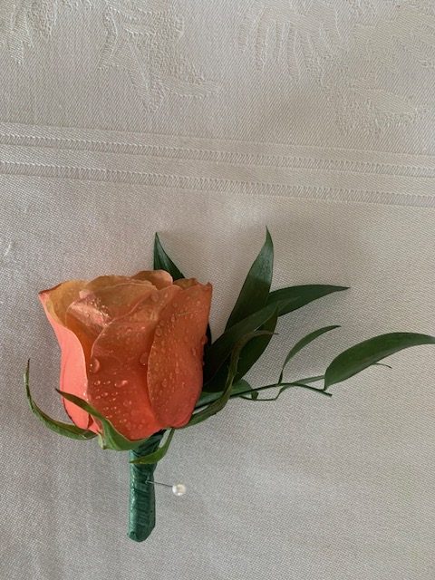 Orange rose boutonniere