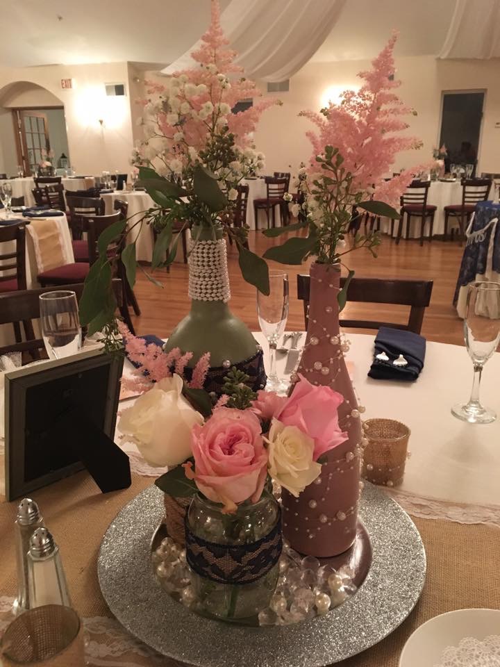 Pink and white rose centerpiece with pink astilbe