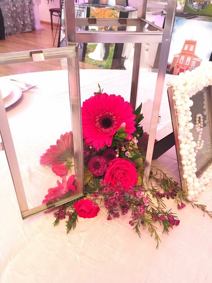 Pink gerbera daisy and rose centerpiece