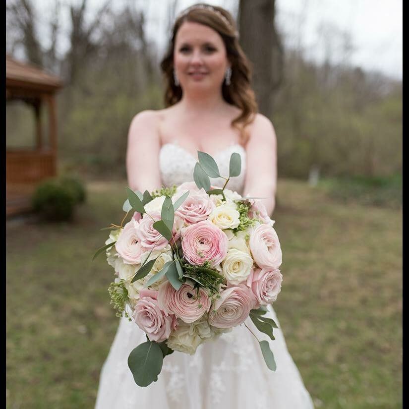 Pink ranunculus and white rose bouquet