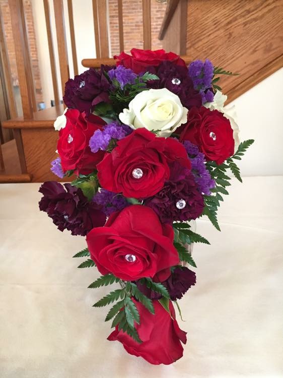 Red rose cascade bouquet with diamond accents