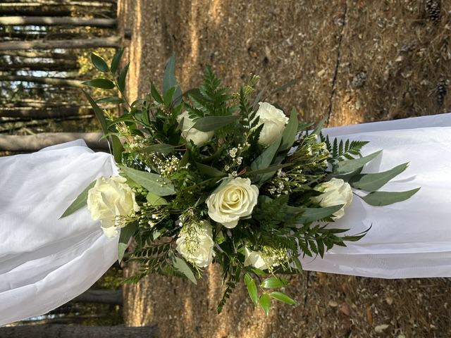 White rose and greenery arbor swag