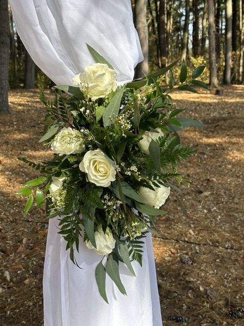 White rose and greenery arbor swag