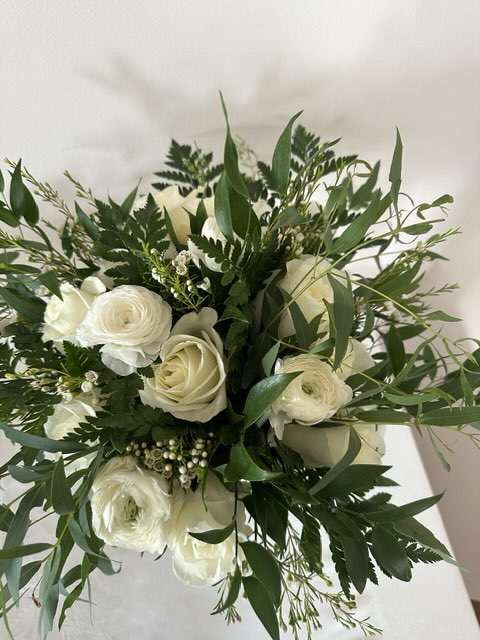 White rose and lush greenery bouquet